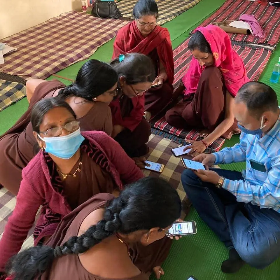 Mitra ji coaching frontline workers in 2020