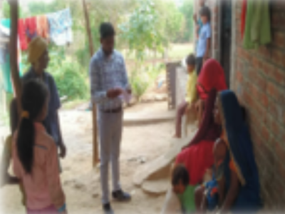 Giyan conducting a home visit